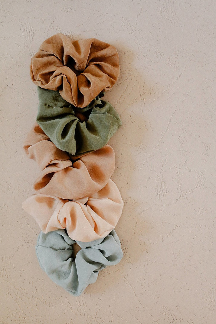 Five scrunchies, various colors