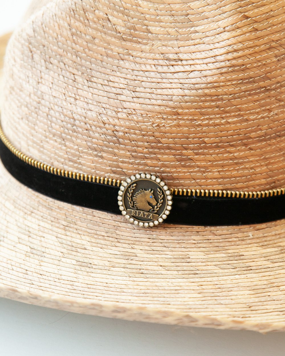 Close-up of band with logo medallion