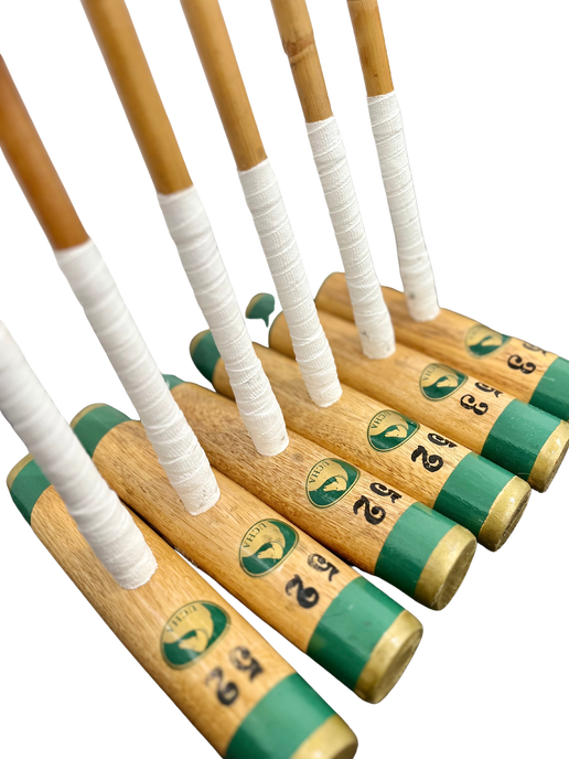 Six polo mallets