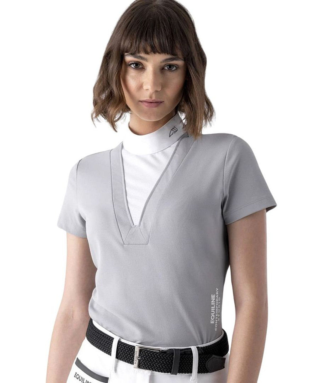 Woman in grey competition shirt