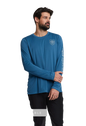 Model in blue long-sleeve training shirt