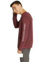 Model in maroon long-sleeve training shirt