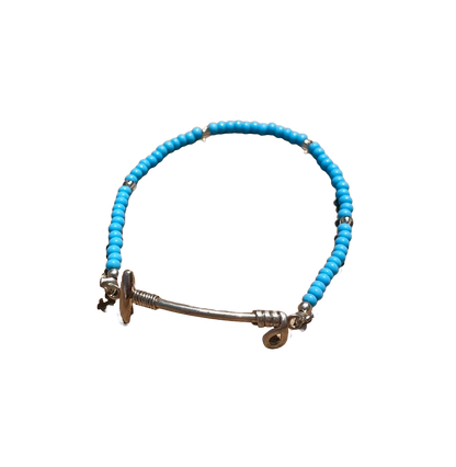 Bracelet with turquoise beads and silver mallet charm