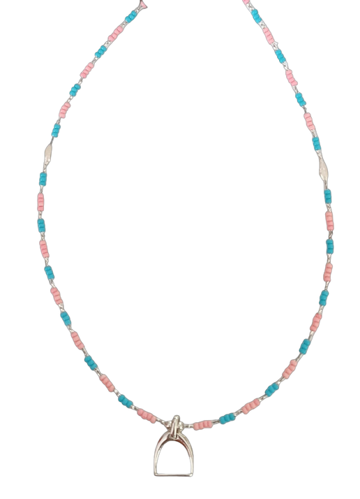 Necklace with pink, blue and clear beads and stirrup charm