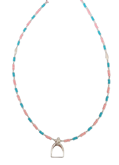 Necklace with pink, blue and clear beads and stirrup charm