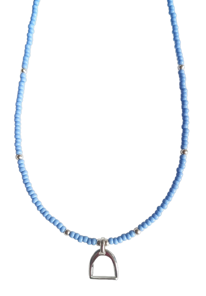 Necklace with baby blue and silver beads and stirrup charm