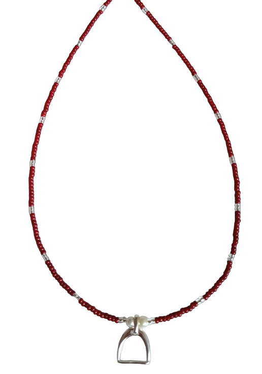 Necklace with red, silver and white beads and stirrup charm