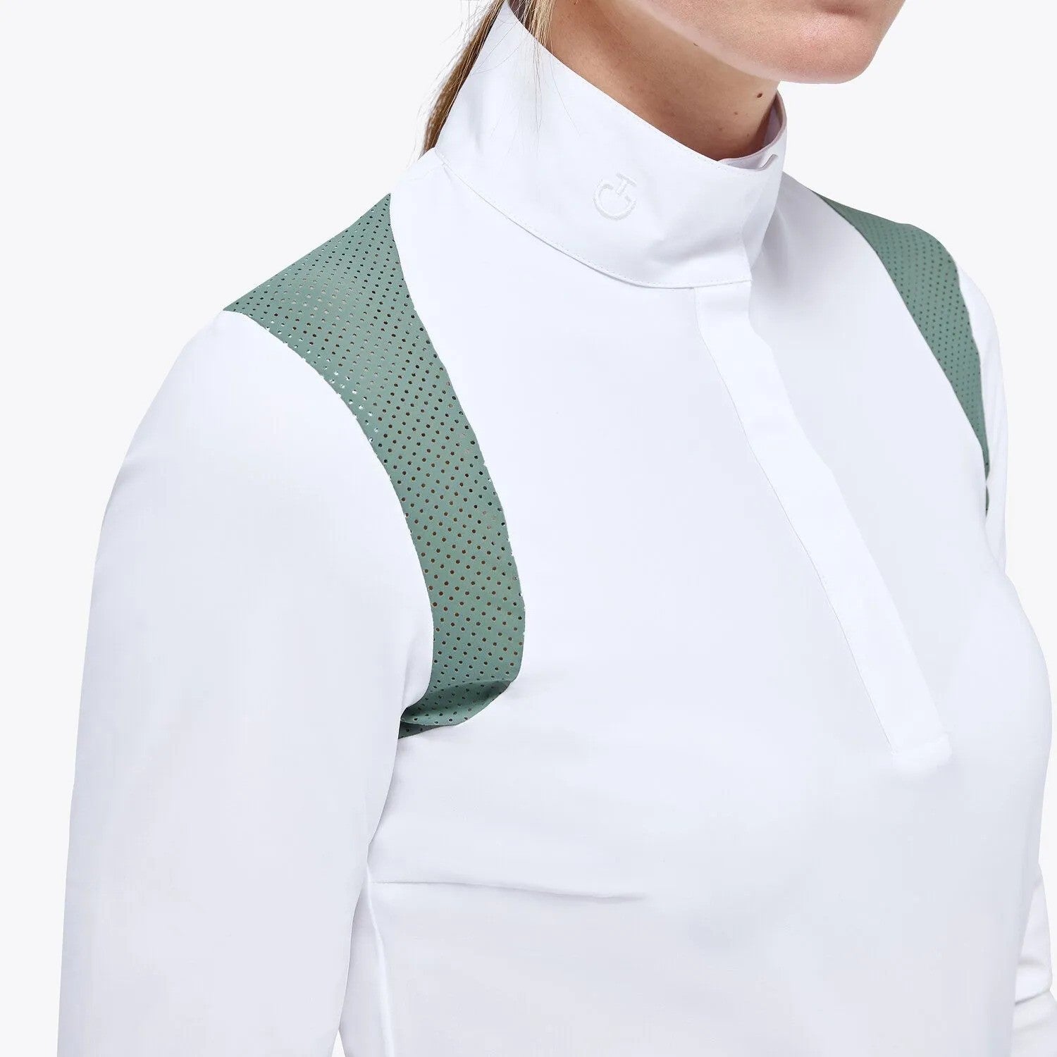 Model in white show shirt with sage green mesh