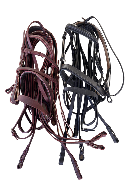 Two complete sets of the deluxe bridles in both colors