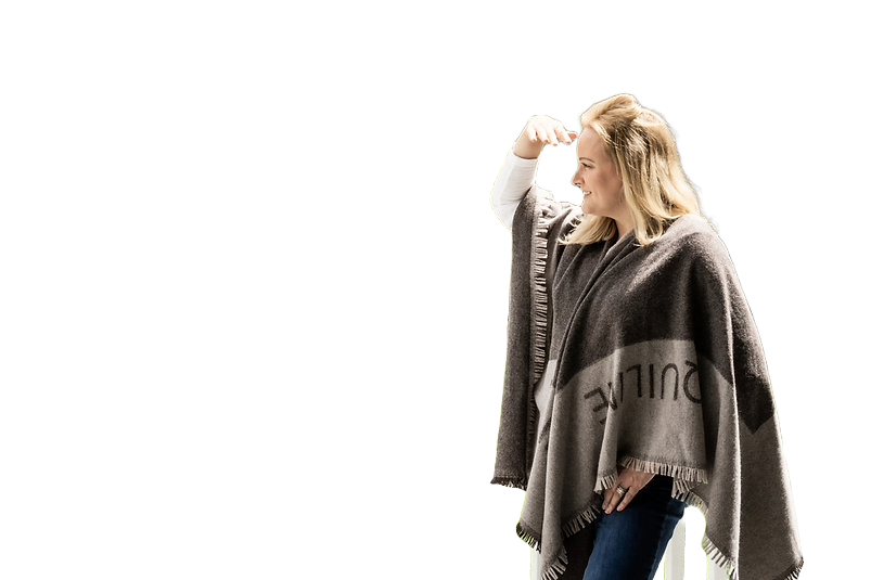 Model in wool poncho with logo