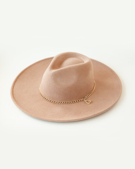 Tan felt hat with stirrup charm