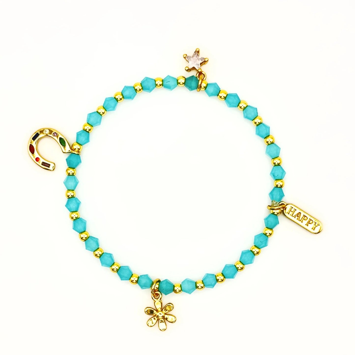 Close up of beaded bracelet with gold charms