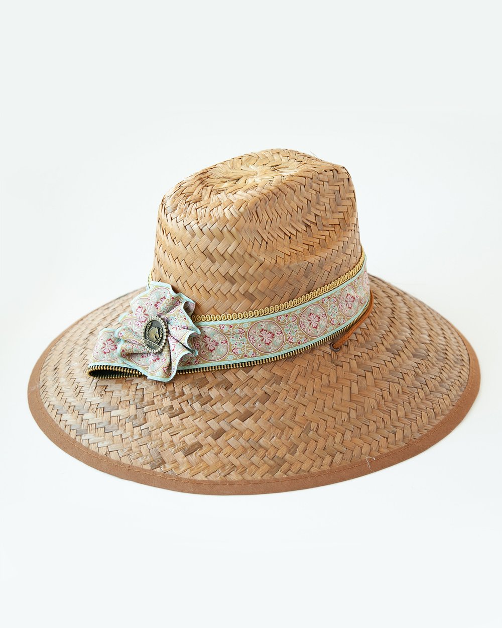 Woven hat with Blue Topaz ribbon in a rosette