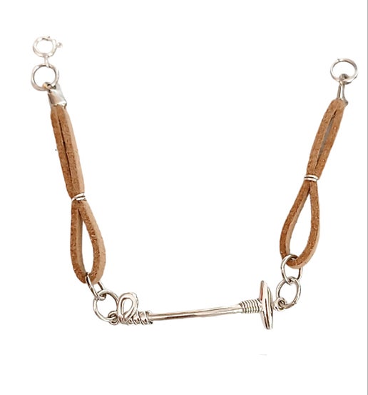 Tan leather bracelet with sterling charm