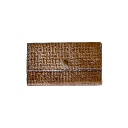 Front view of stamped tan leather wallet