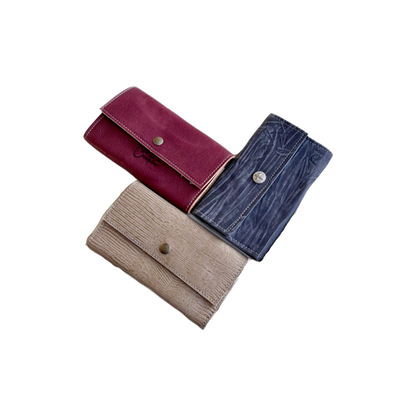 Three wallets, various colors