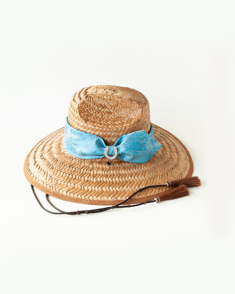 Woven hat with blue silk band and horseshoe charm