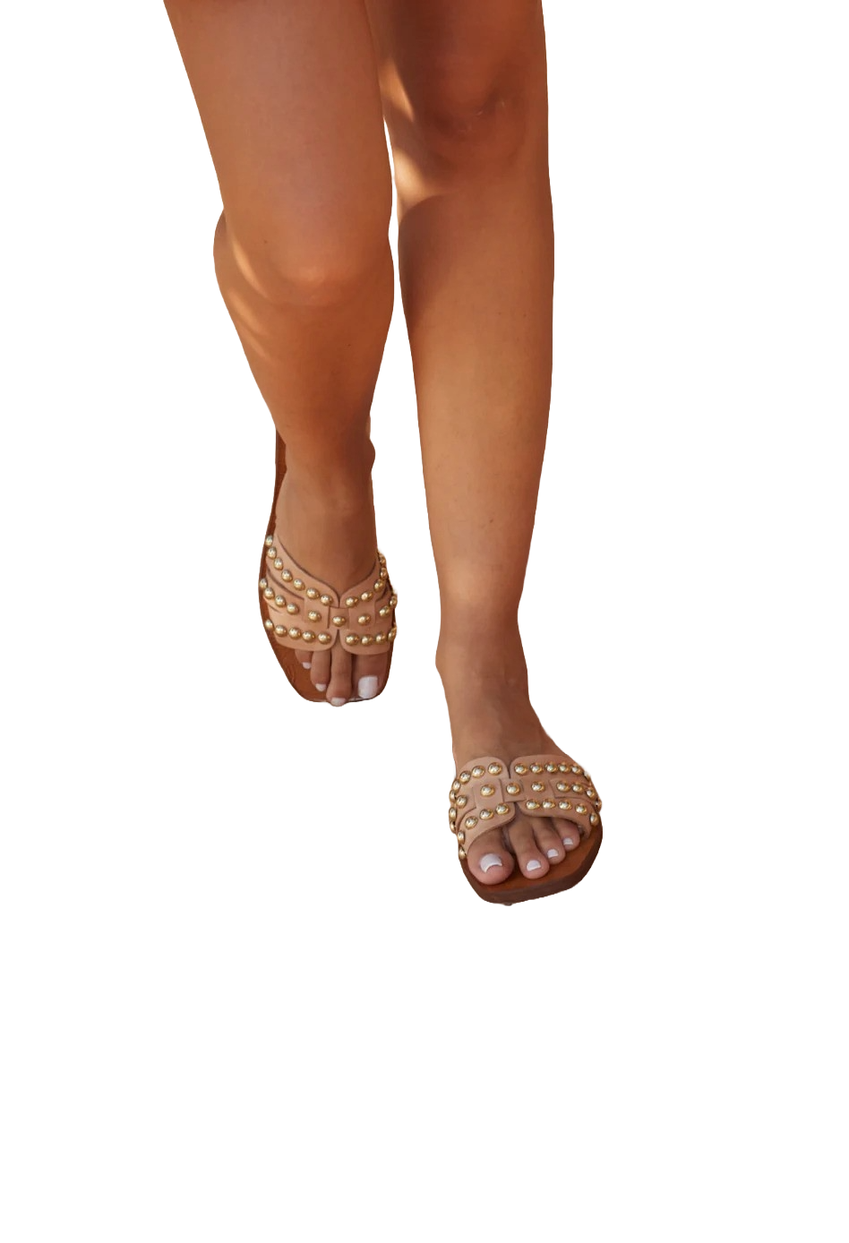 Model wearing slide sandals with rivets