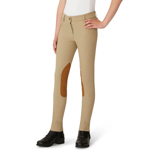 Model in beige riding breeches with suede knee grips