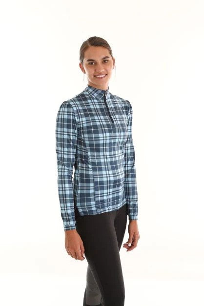 Model wearing blue long-sleeved plaid sun shirt